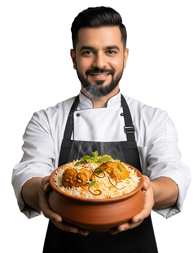 Indian chef holding a freshly prepared curry at an Indian Restaurant in Brighouse - Swadish